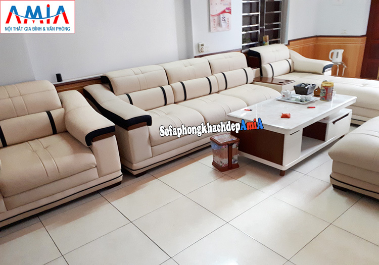 Hình ảnh Sofa phòng khách lớn chất liệu da hiện đại có kèm ghế đơn tay vịn và đôn lớn hiện đại